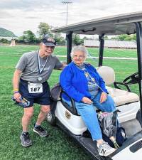 Lorne McDonald, who marked 1,001 races after this event, stands with Jane Ridley.