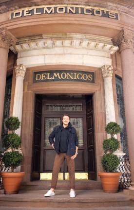 Max Tucci stands in front of Delmonico’s.