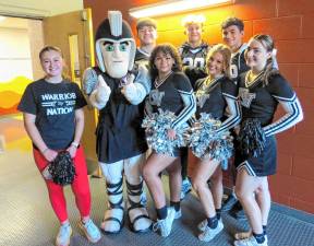 L-R Back: Christopher DellaBella, Luke Brazanskas, and Logan Olsommer. L-R Front: Angie Barcia, The Warrior, Gianna Peralta, Charlie Cook, and Audrey Foster.