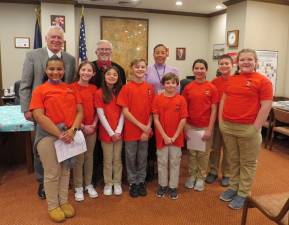 Back L-R: Ronald Schmalzle, Matthew Osterberg, and Christa Caceres. Front L-R: Lihanna Rewoldt, Lynnae Kresse, Aria Gonzalez, Jackson Cabrera, Russell Fowler, Evoni Krasulski, Theodore Stierle, and Rachel Pflanz.