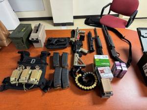 The weapons and related gear allegedly seized from a home in Deerpark.