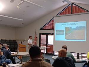 PCCD district engineer Chris Meszler presents on project site inspections.