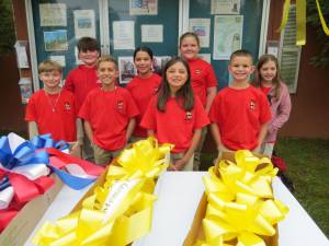 L-R: Killian Nearing, Avery Stewart, Bryce Holtzer, Evoni Krasulski, Aria Gonzalez, Rachael Pflanz, Richie Mai, and Mackenzie McAdam.