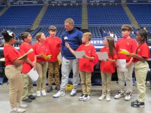 L-R: Lihanna Rewoldt, Liam Olsommer, Lynnae Kresse, Logan Fischer, Coach Rhoades, Bryce Holtzer, Sofia Boccaletti, Avery Stewart, and Jaelynn Monk.