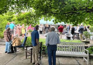 Supporters of the Milford Readers &amp; Writers Festival gathered earlier this year at the annual garden party to hear about what’s on tap for September.