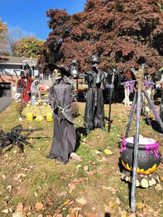 <b>Dozens of figures are set up in front of this home at Main and Clarkson streets in Newton. (Photo by Kathy Shwiff)</b>