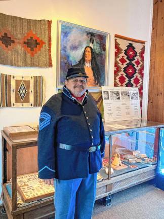 Historical Society President Tim Singleton in the museum.