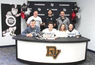 L-R Front: Jason Rabolli, Noah Rabolli, Amanda Rabolli and Lorelei Rabolli. L-R Back: Head lacrosse coach Jeff Krasulski, assistant coach Anton Mackey, and assistant coach Daniel Gonzalez.