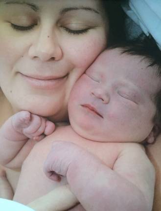 Photo submitted by Randi Adamitis of Vernon First Place winner - &quot;Mommy and Mallory. Taken at the hospital just one day old.&quot;