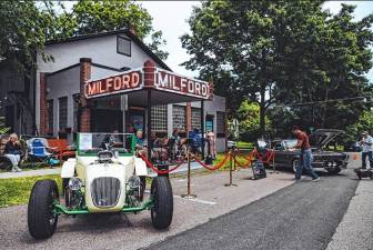 A shot from last year’s music festival, featuring vintage cars in front of the Milford Theater.