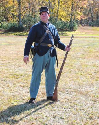 A soldier in blue, ready to act.