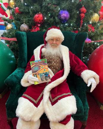 Santa during last year’s stop at the mall.