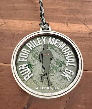 The finisher medal received by race runners.