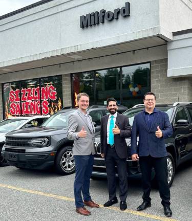 Joey Baierlein, left, Carlos Roedan and John Costa invite you to stop by Milford’s Chrysler Dodge Jeep and RAM dealership to participate in its Back-to-School giveaway, where you could win a $1,000 shopping spree and while supporting local schools. Provided photo.