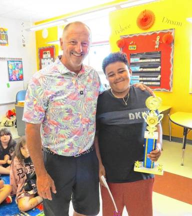 Xander Hamilton from Delaware Valley Elementary School with teacher Chris Neidig.