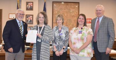 Pike County commissioners Matt Osterberg and Ronald Schmalzle with WMCHC representatives. Absent from photo but attending virtually was Pike County Commissioner Christa Caceres.