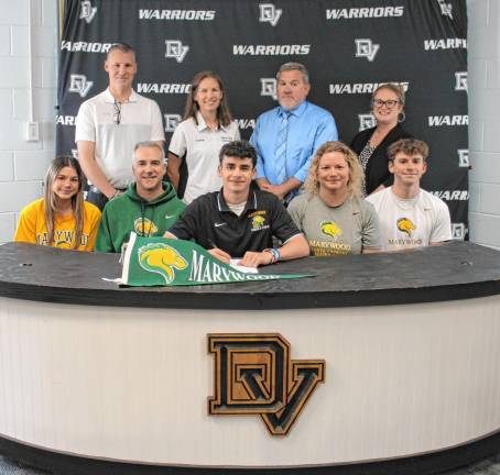 L-R Front: Frannie Russo (sister), Nino Russo, Bobby Russo, Robin Russo and John Russo (brother). L-R Back: DV Athletic Director Sean Giblin, cross country head coach Audrey Dennis, track head coach Nick Quaglia, and guidance counselor Jess Favorito.
