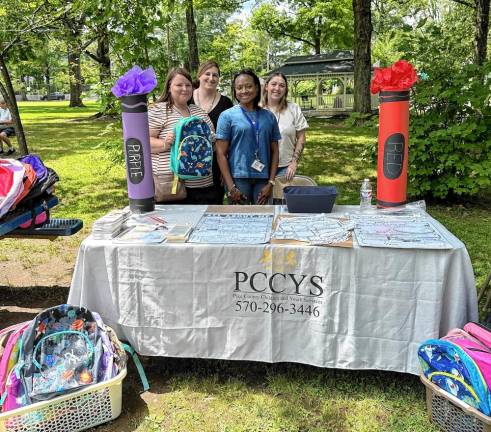 Program support manager Kristy Steckel, program support staff Heather Maringo, administrator Michele Burrell, and case aide Cassidy Kaufmann.