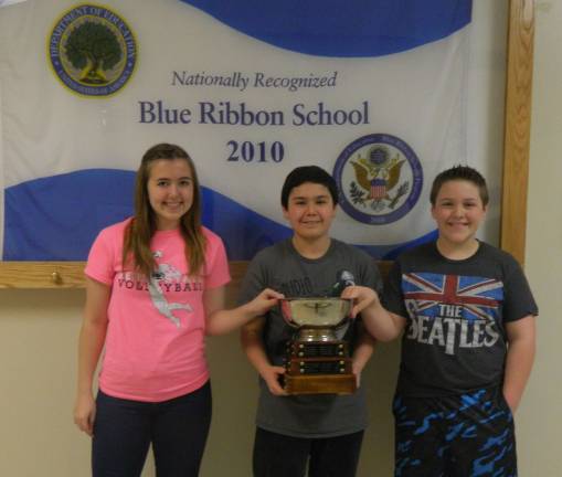From left: 2nd place, Skylar U'Glay, 8th grade; champio,n Darius Bermudez, 7th grade; 3rd place, Josh Caraballo, 6th grade (Photo contributed)