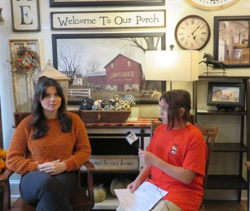 <i>Julia Roome , left, is interviewed by DVE-News/TV reporter </i>Alice Aguirre.