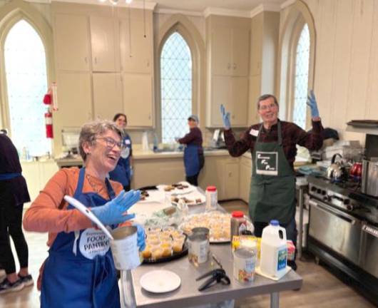 Folks at the Ecumenical Food Pantry and Good Shepherd Episcopal Church prepping a recent community lunch.