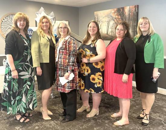 L-R: Carmel Santiago, office assistant/job developer; Mary Beth Sayles, workforce specialist; Randy Philhower; Martyna Brzeska, career counselor; Rebekah Marte, career counselor; and Workforce Development Agency Director Cindy DeFebo.