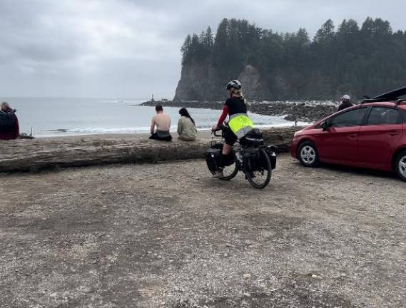 Milford’s Suzanne Williamson reaches the Pacific Ocean.