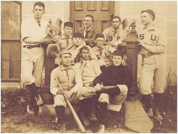 Stephen Crane (front, center) sits with teammates in 1891. &#x201c;I have never been in a battle, of course,&quot; Crane wrote. &#x201c;I believe I got my sense of the rage of conflict on the football field.&#x201d; (Photo courtesy of Syracuse University Special Collections Research Center)