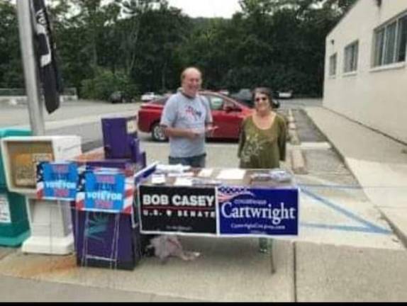 A group supporting Democrat candidates stationed outside the Milford Post Office, at nearly the same location as other groups.