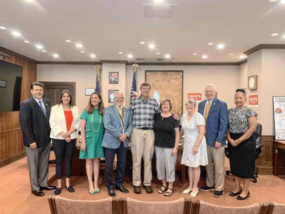 L-R: Rep. Jeff Olsommer; Pike County Board of Elections Director Nadeen Manzoni; State Senator Lisa Baker; Commissioner Matthew Osterberg; inductees James Jennings, Donna Jennings, and Linda Harding; and commissioners Ronald Schmalzle and Christa Caceres.