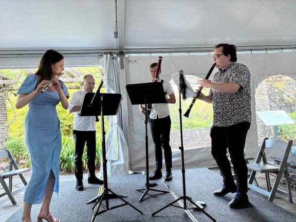 The Frisson Winds Quartet (L-R): Anna Urrey on flute, Tom Gallant on the oboe, Taylor Smith on bassoon, and Bixby Kennedy on clarinet.