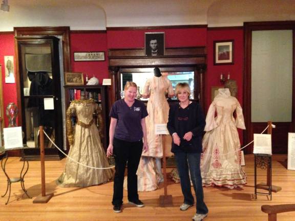 Museum Vintage Clothing Committee members Roxanne and Karen with the Gourlay costumes (Photo provided)