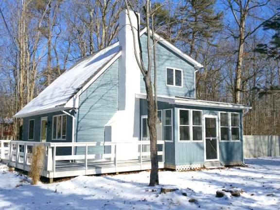 Updated, immaculate saltbox in the woods