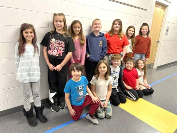 The DVES Students of the Month for November. L-R Back: Lia Puopolo, Macy Ellis, Kiara Castellanos, Jayce Jacobs, Kelsie Johnson, Lyla Barry, and Vayda Kresse. L-R Front: Joseph Moran, Amara Golobrodsky, Tiegon Monahan, Connor Schuman, and Elise Haber. Not Pictured: Jessie Zdral and Emma Hill.