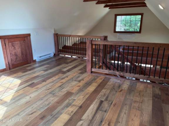 Renovated country home features acreage and low taxes