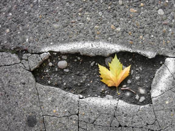 An example of a pothole one may encounter on the road.