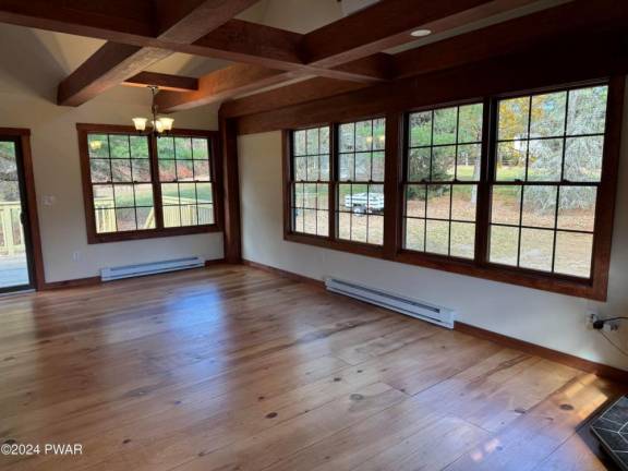 Renovated country home features acreage and low taxes