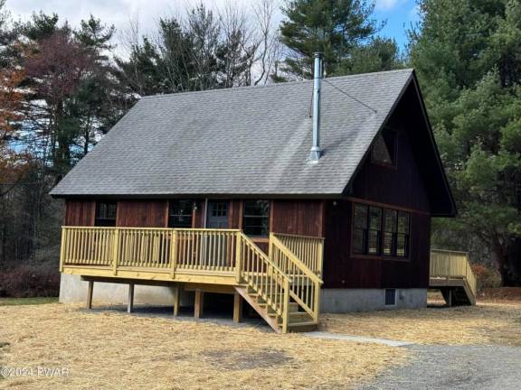 Renovated country home features acreage and low taxes