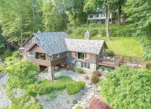 This home is nestled high above stunning Lake Mohawk