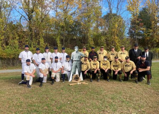 Delhi Polecats and the Mountain Athletic Club teams dress in nineteenth-century baseball uniforms with a life-sized cut out of Zane Grey in his University of Pennsylvania uniform.