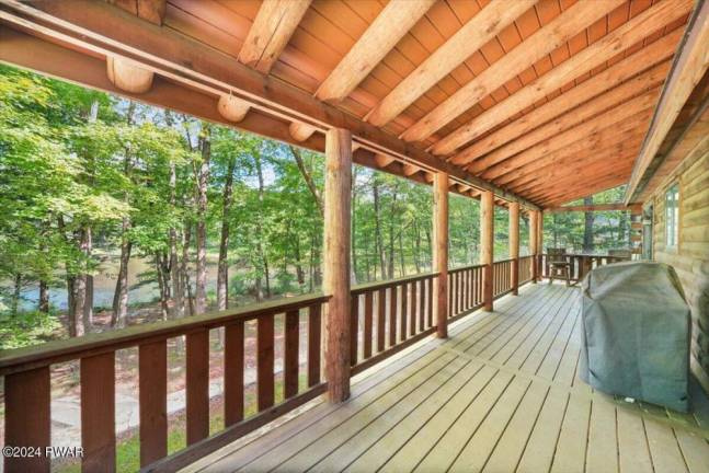 Lakefront log cabin in a private setting is a slice of paradise