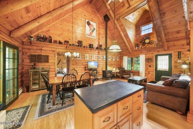 Lakefront log cabin in a private setting is a slice of paradise