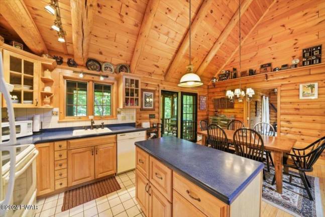 Lakefront log cabin in a private setting is a slice of paradise