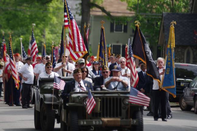 Military veterans await the start of the Memorial Day parade.