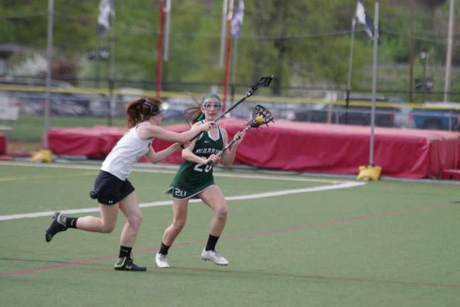 From left Delaware Valley's Alexa Butaitis keeps pace with Minisink Valley's Amanda Fitzpatrick. Fitzpatrick scored 8 goals.