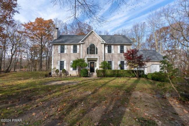 Upscale five-bedroom colonial combines luxury and practicality