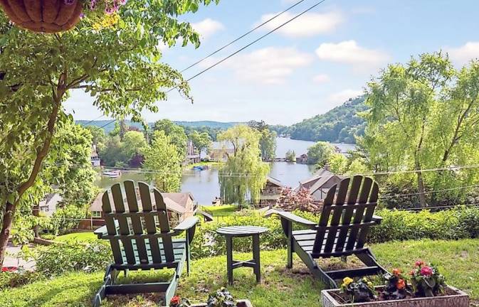 This home is nestled high above stunning Lake Mohawk