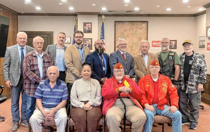 L-R Back: Pike County Commissioner Ronald Schmalzle, George Haney with American Legion Post 851 of Dingmans Ferry, Greater Pike Community Foundation Executive Director Rick Little, Greater Pike Community Foundation Board Chair Luke Turano, Pike County Veterans Affairs Office Director Jesiah Schrader, Pike County Commissioner Matthew Osterberg, VetStock secretary Allan Schatz, Mike Barth of the Milford Marsch-Kellogg American Legion Post 139, and John Kupillas of Milford Veterans of Foreign War. L-R Front: Joe Scebetta of Newman Smith American Legion Post 514, Pike County Commissioner Christa Caceres, Gary Brink of Gung Ho Marine Corp League, and Don Knight of Gung Ho Marine Corp League.