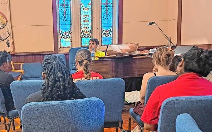 Braeden Ross at the piano during a rehearsal.