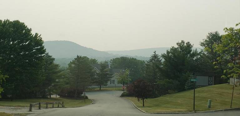 Locals found an unsettling haze over the tristate area. Along with the smoke came numerous reports of a faint burning smell. Photo: Ann Marie Vitoulis